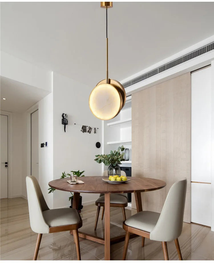 Luzana - Runde Marmor-Wandleuchte mit Kupferfinish in Gold
