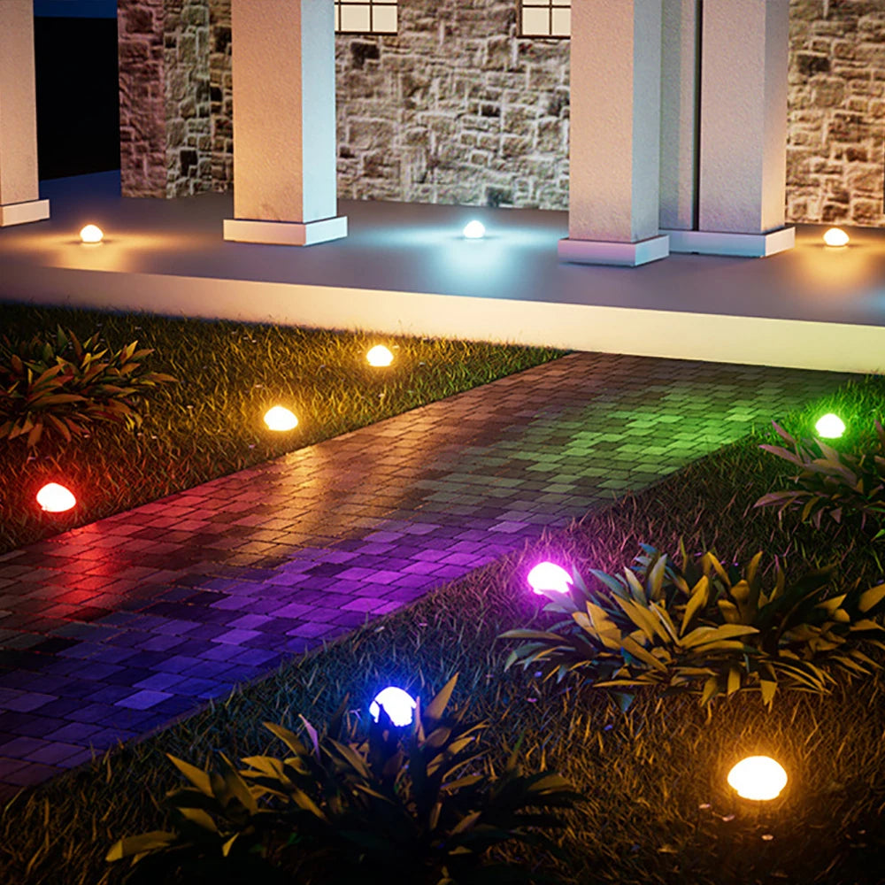 Routa - Solar-Gartenleuchte im Kieselstein-Design aus Glas