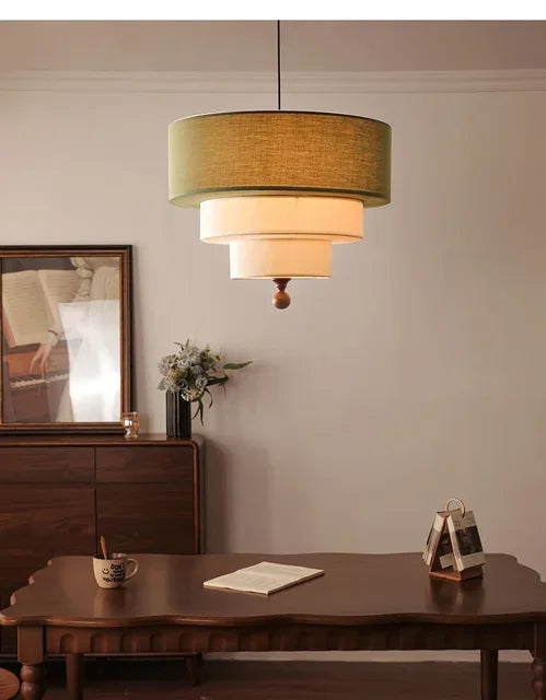 Polara - Boho-Hängeleuchte aus Stoff in Grün/Beige mit Holz-