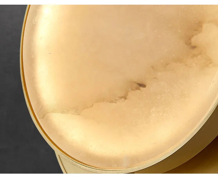 Luzana - Runde Marmor-Wandleuchte mit Kupferfinish in Gold