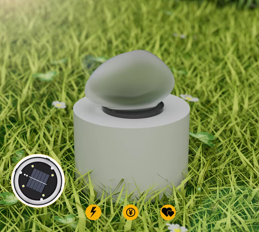Routa - Solar-Gartenleuchte im Kieselstein-Design aus Glas