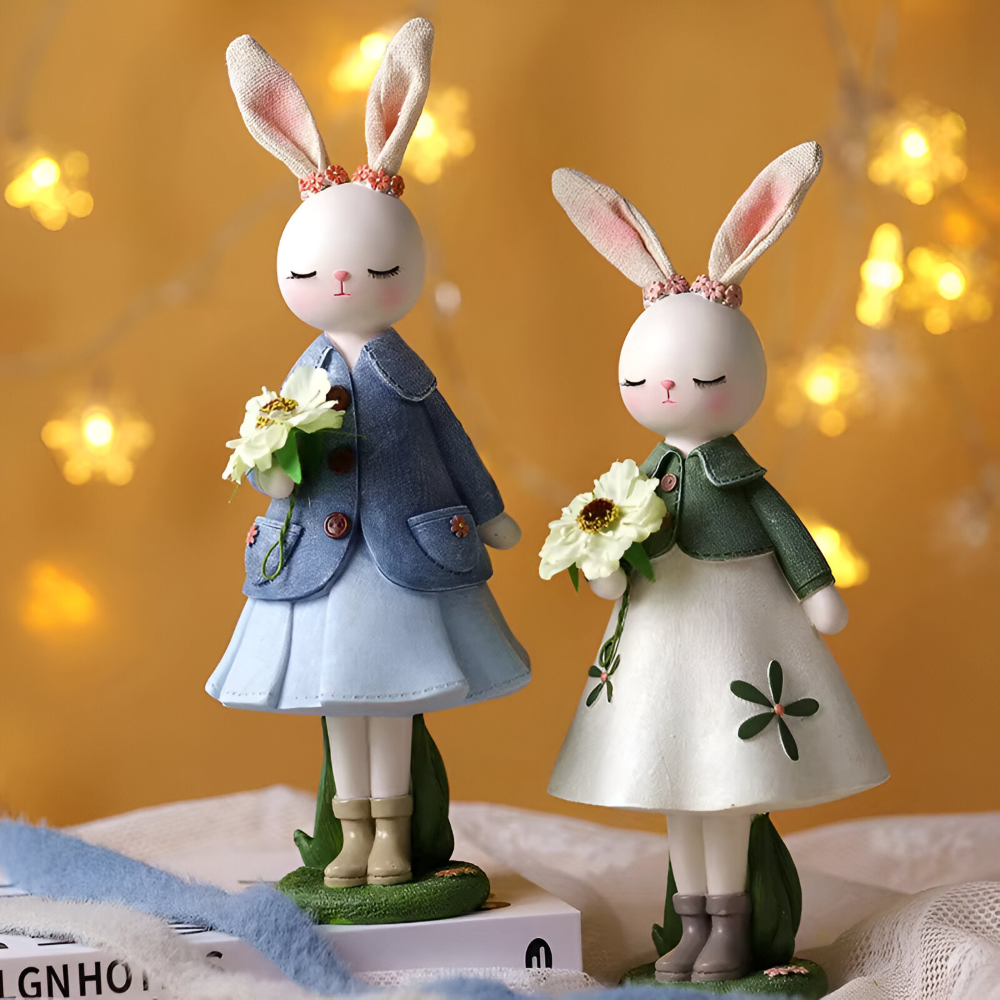 Oster - Elegante Oster Hasenfigur aus Harz mit Kleid & Blume