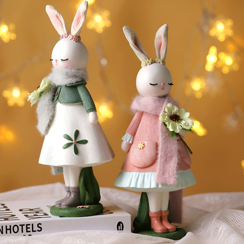 Oster - Elegante Oster Hasenfigur aus Harz mit Kleid & Blume