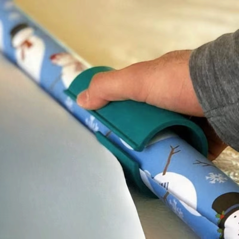 WrapCaddy - Geschenkpapier-Schneider mit Eingebauter Klinge und Flexibler Halterung