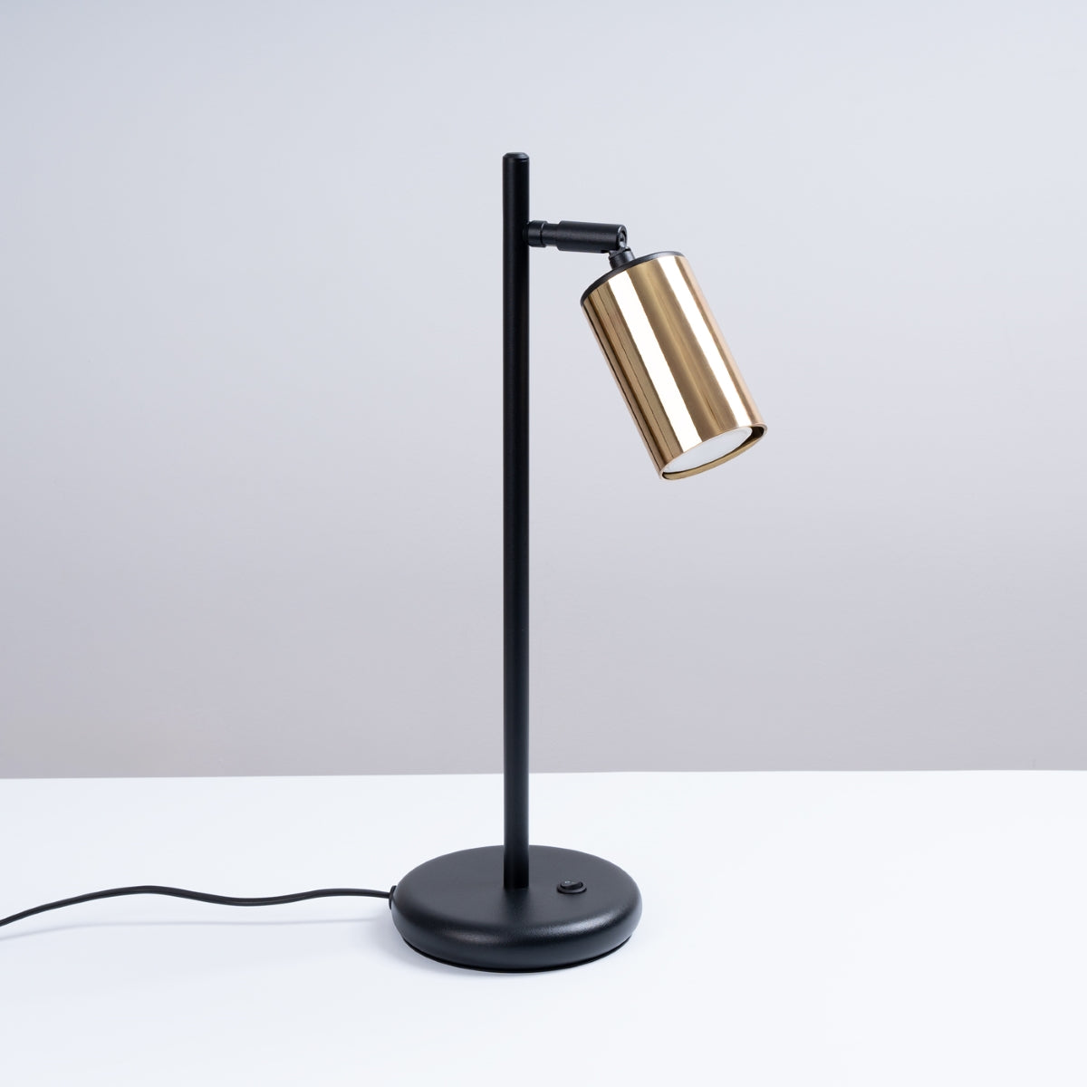 Lumiera - Tischleuchte aus schwarzem/goldenem Stahl