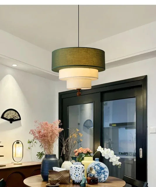 Polara - Boho-Hängeleuchte aus Stoff in Grün/Beige mit Holz-