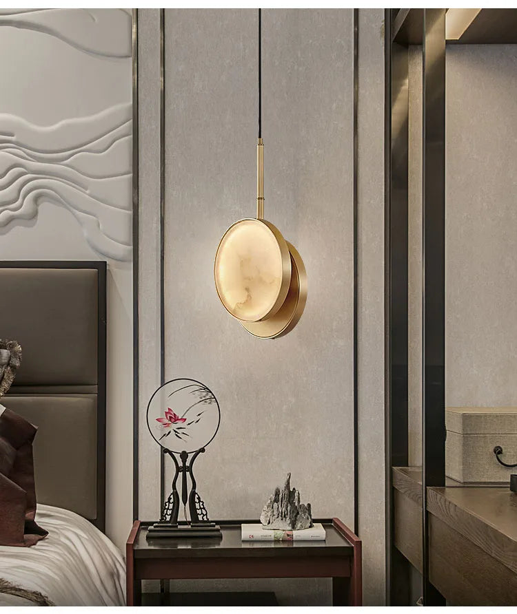 Luzana - Runde Marmor-Wandleuchte mit Kupferfinish in Gold