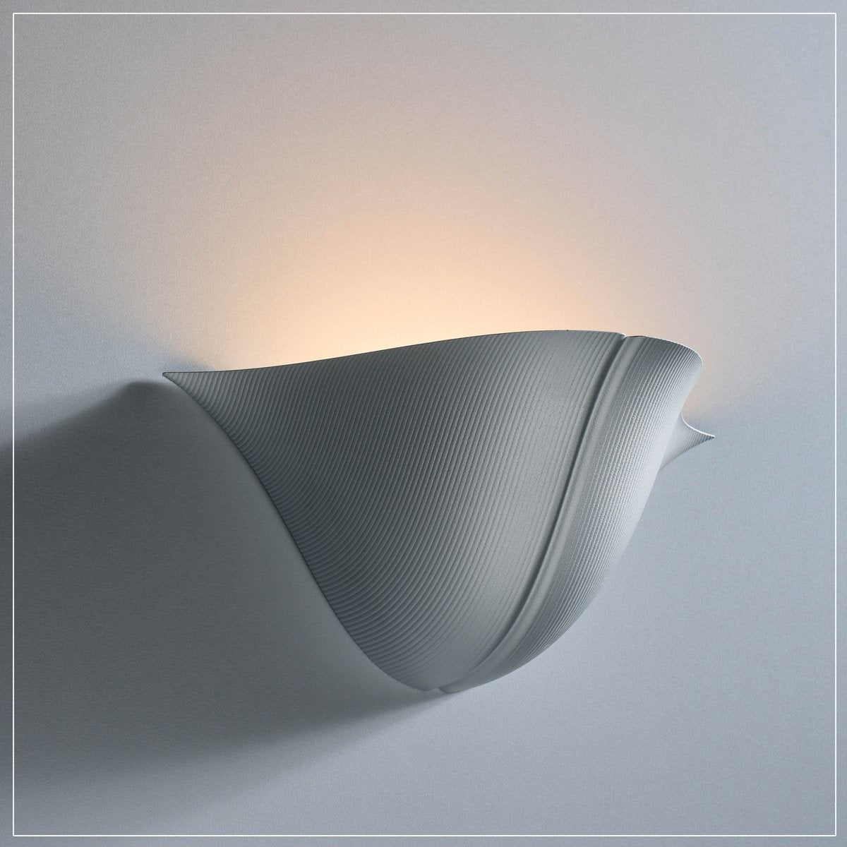 Muschelförmige - LED-Wandleuchte aus Aluminium
