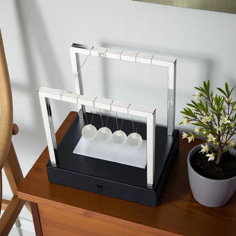 LED-Newton-Pendel für hypnotische Bewegung und Lichtspiel