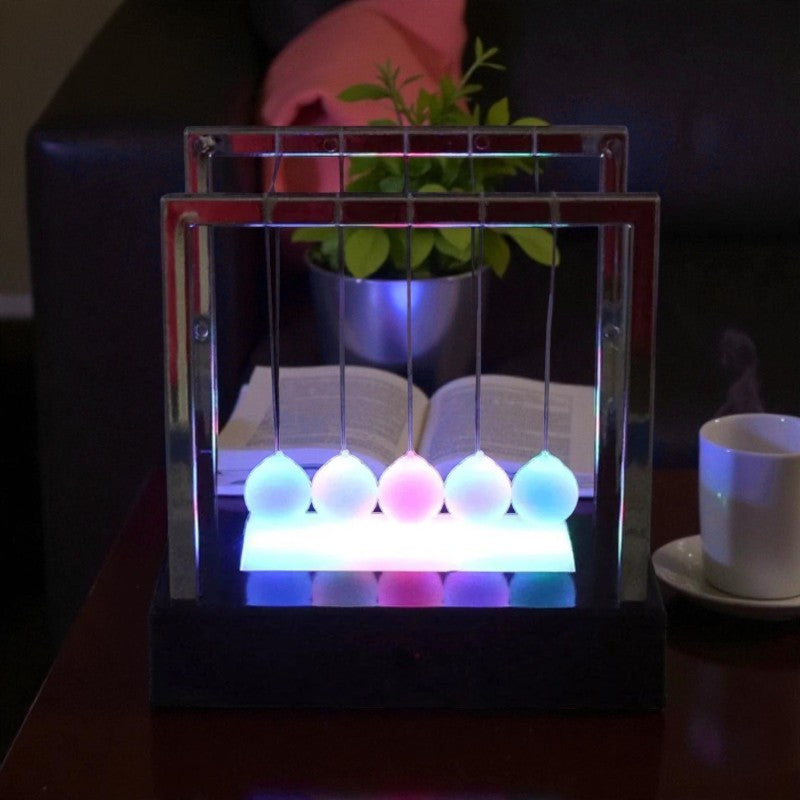 LED-Newton-Pendel für hypnotische Bewegung und Lichtspiel