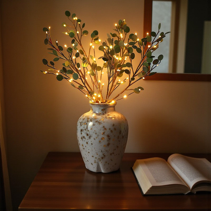 LED-Lampe mit Olivenzweig-Design und sanftem, warmem Licht