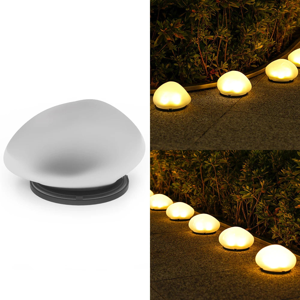 Routa - Solar-Gartenleuchte im Kieselstein-Design aus Glas