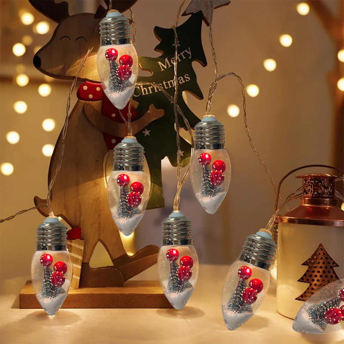 Girla - LED-Schneekugel-Lichterkette mit Weihnachtsbaum und