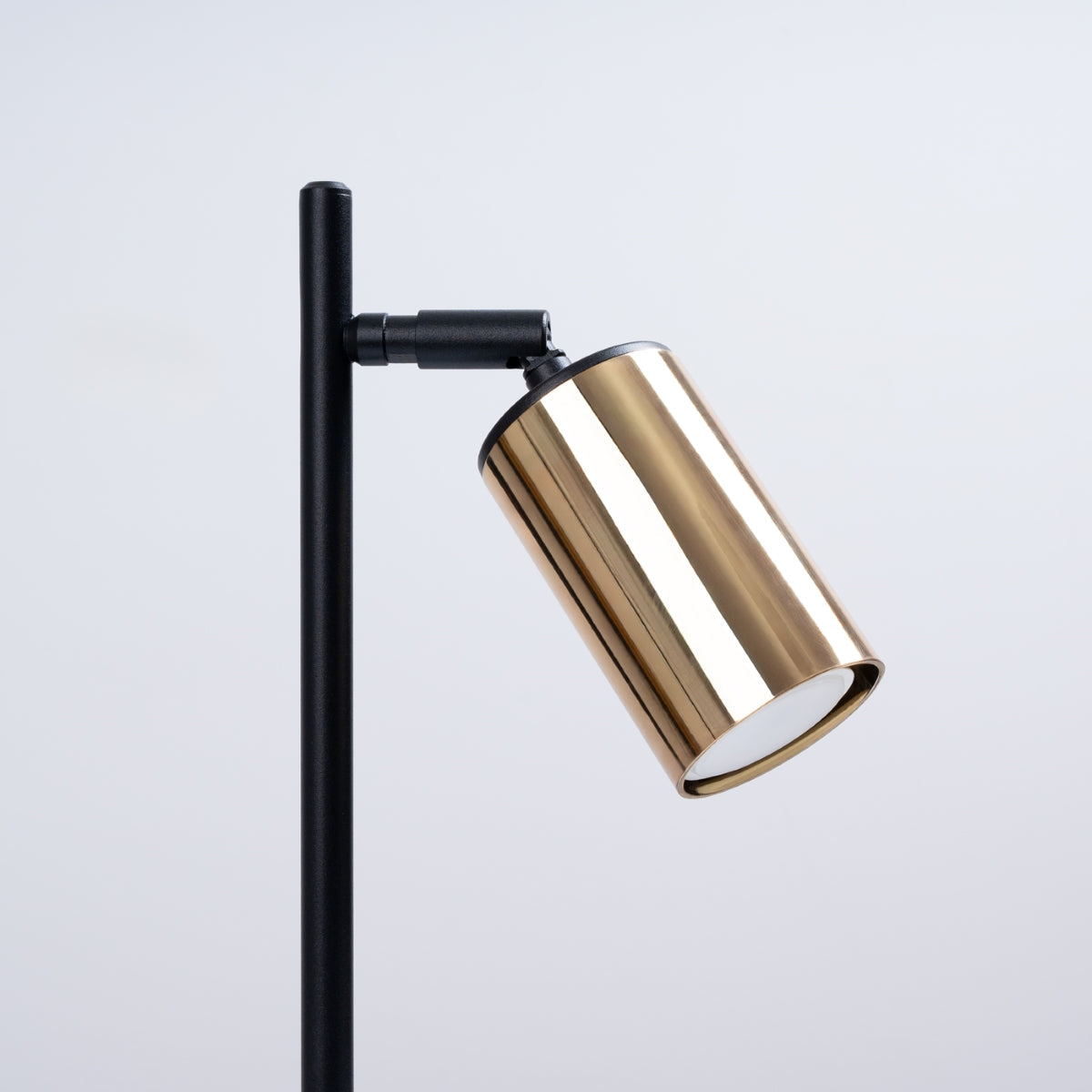 Lumiera - Tischleuchte aus schwarzem/goldenem Stahl