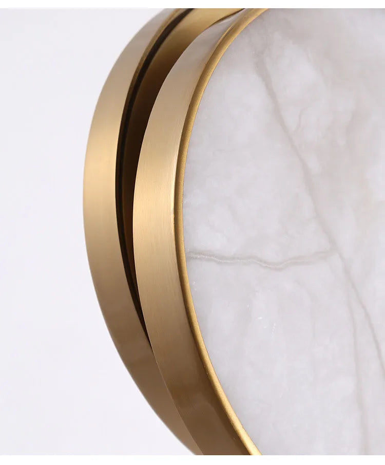 Luzana - Runde Marmor-Wandleuchte mit Kupferfinish in Gold
