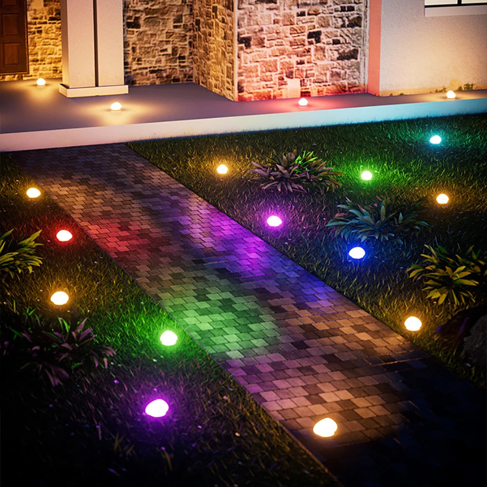 Routa - Solar-Gartenleuchte im Kieselstein-Design aus Glas