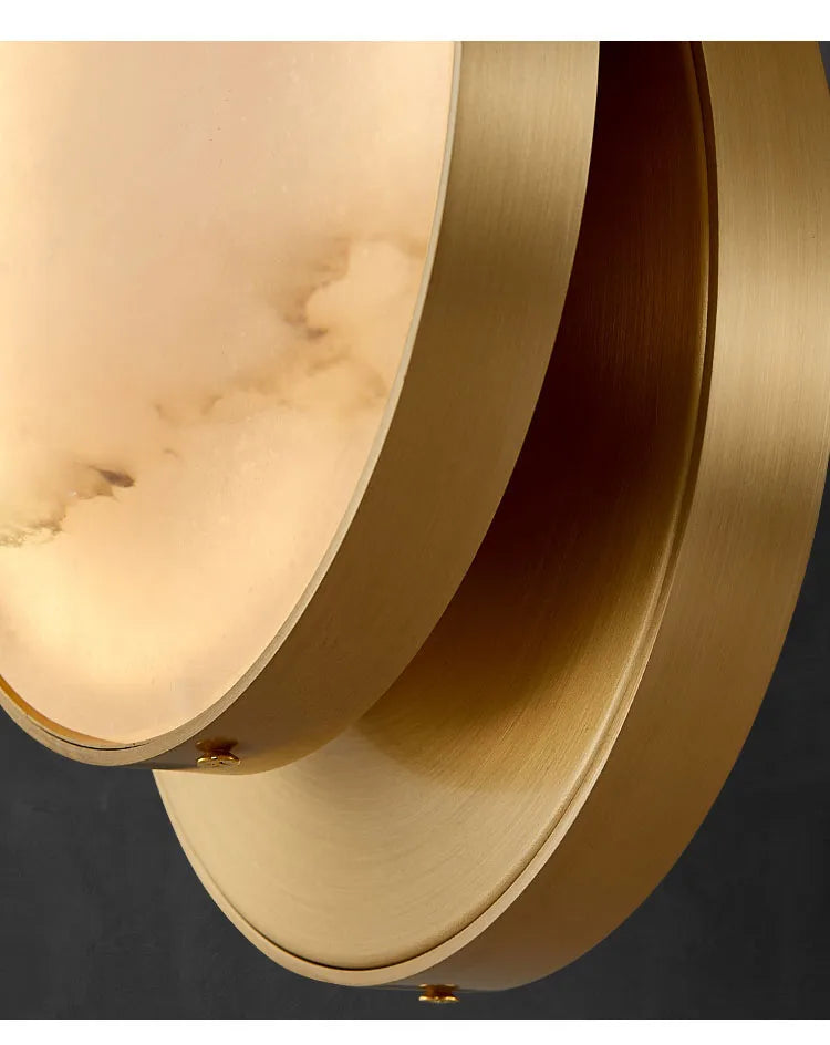 Luzana - Runde Marmor-Wandleuchte mit Kupferfinish in Gold