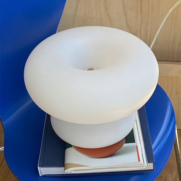 Donutförmige - Tischleuchte aus Glas und Metall