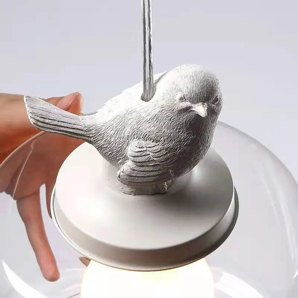 Solara - Vogel-Pendelleuchte aus Glas und Stein