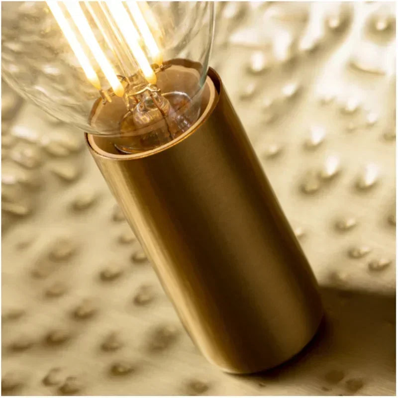 Lucero - Goldene Pendelleuchte im Lotusblatt-Design mit