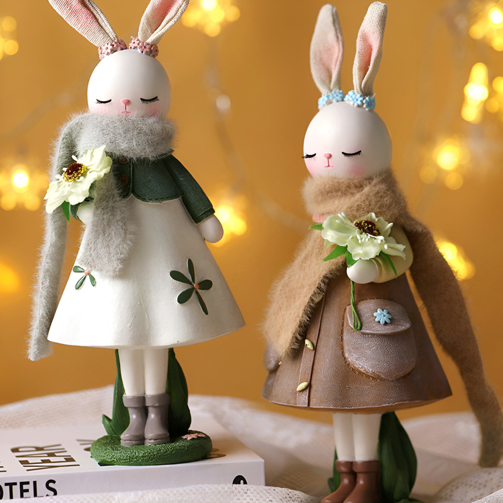 Oster - Elegante Oster Hasenfigur aus Harz mit Kleid & Blume