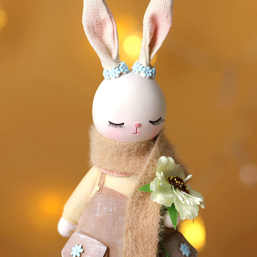 Oster - Elegante Oster Hasenfigur aus Harz mit Kleid & Blume