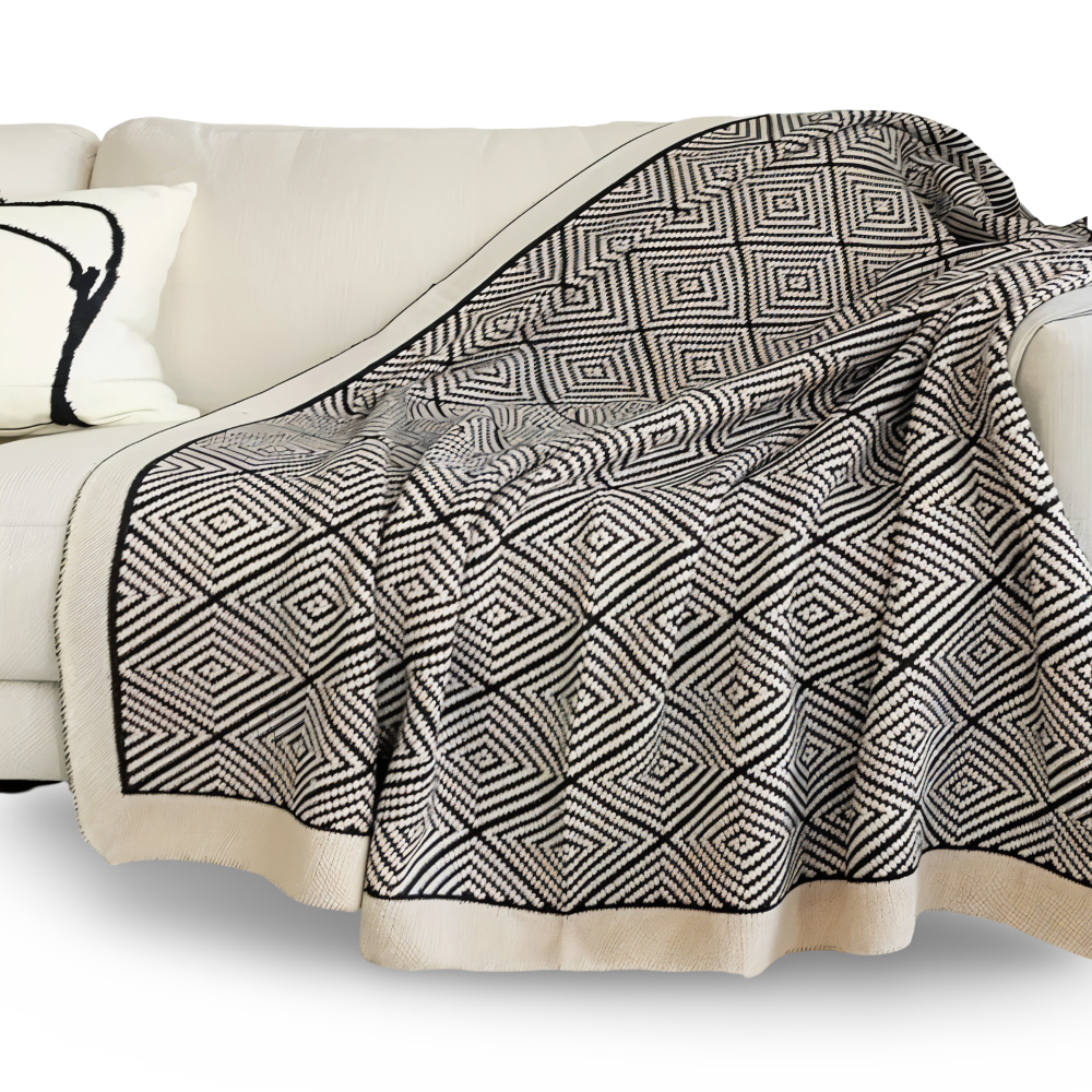 Schlafix - Schwarz-Weiße geometrische Fleece Decke aus