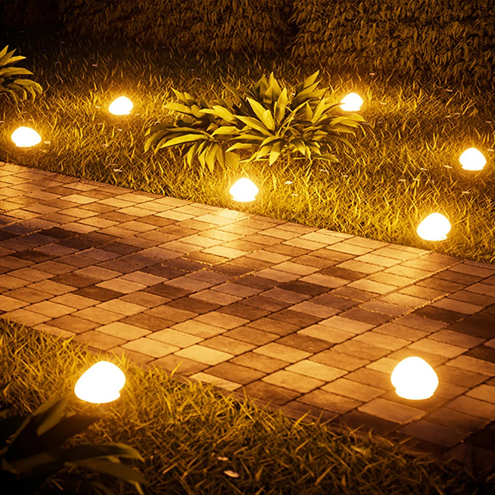 Routa - Solar-Gartenleuchte im Kieselstein-Design aus Glas