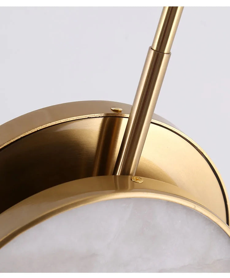 Luzana - Runde Marmor-Wandleuchte mit Kupferfinish in Gold