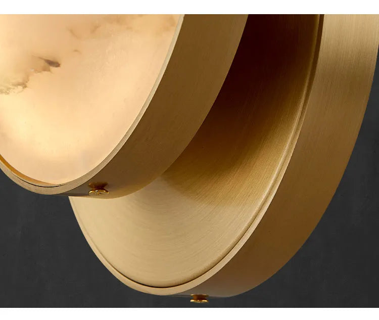 Luzana - Runde Marmor-Wandleuchte mit Kupferfinish in Gold