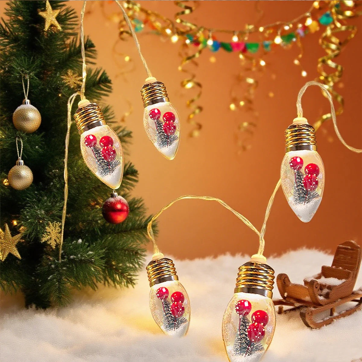 Girla - LED-Schneekugel-Lichterkette mit Weihnachtsbaum und