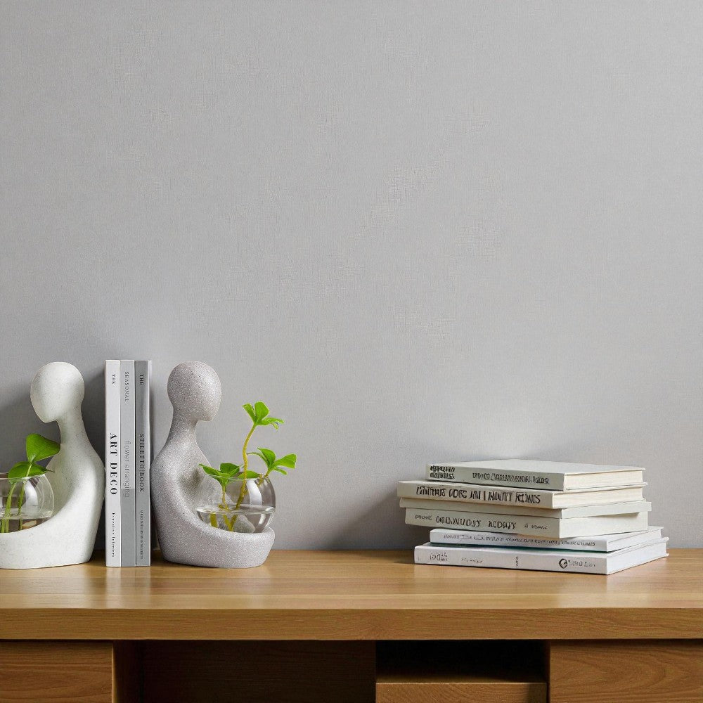 Transparente Vase mit integrierter dekorativer Figur